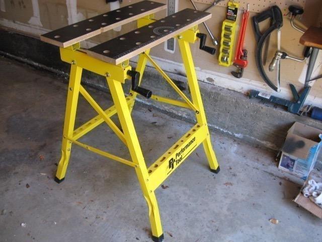 Performance Tool W54025 Portable Folding Workbench and Vise | 200 lb capacity folding work table. Printed grid, ruler and protractor. Includes 4 bench dogs and tool storage rail customer photo 2