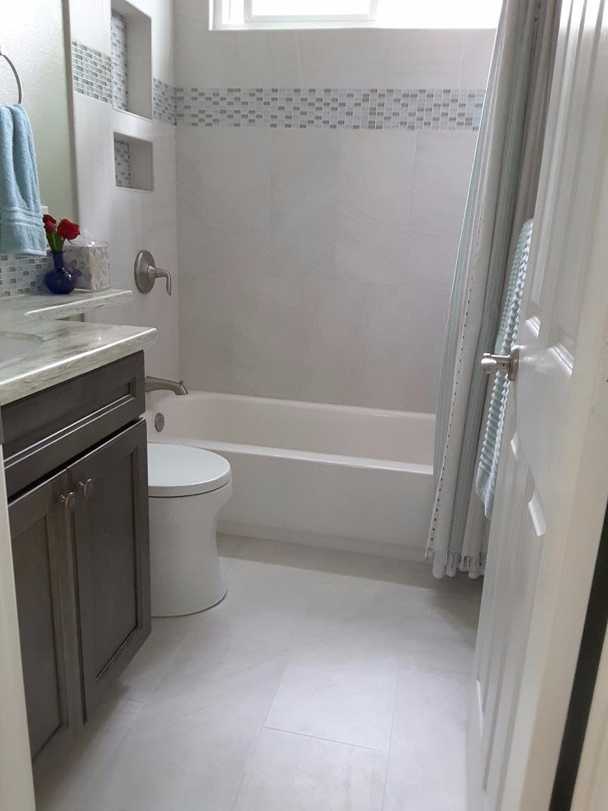 KOHLER K-4007-0 San Souci One-Piece Round-Front Toilet with Left-Hand Trip Lever, Includes Reveal Quiet-Close Toilet Seat, 1.28 GPF, White customer photo 2