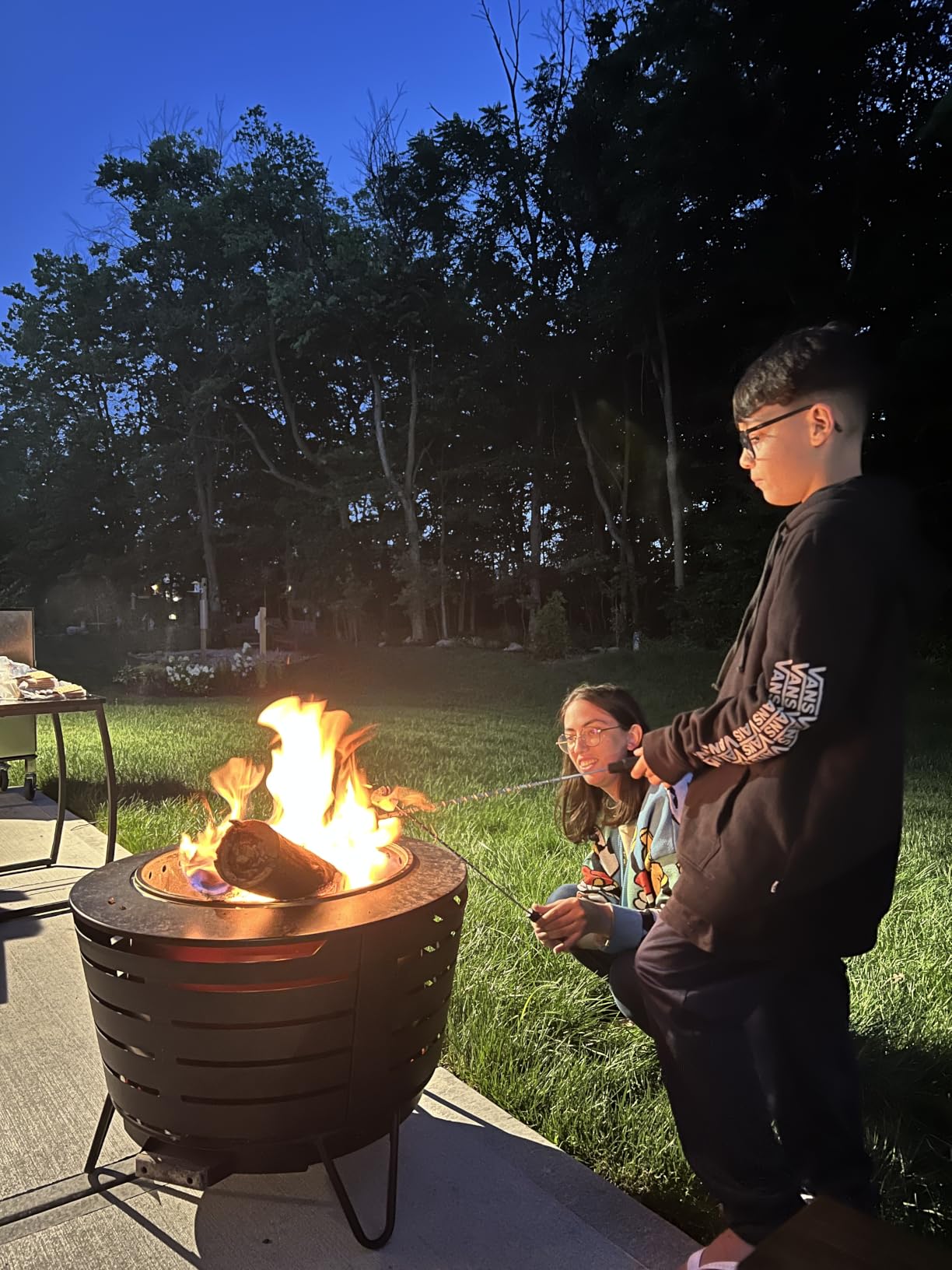 TIKI Patio Smokeless Fire Pit, 25 in Wood Burning Fire Pit with Cover | Black, 25-Inch, Stainless Steel, Wood-Burning, For Backyards and Patios, Includes Cover, Removable Ash Pan, Stand Included customer photo 2