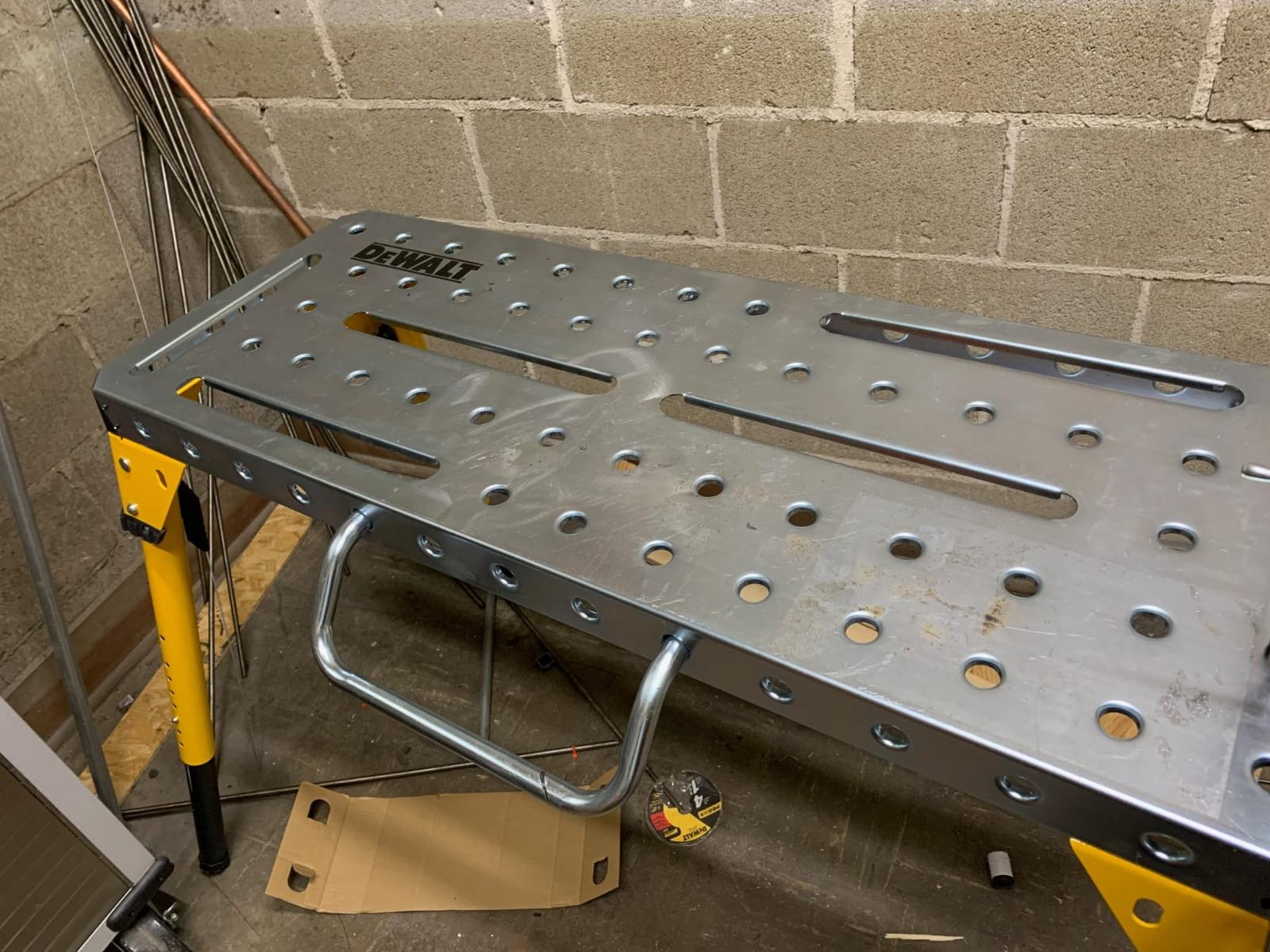 Dewalt Adjustable Height Portable Steel Welding Table and Work Bench, 18 x 46-inch Tabletop, Folding Legs, Carrying Handle, and Cord Minder customer photo 1