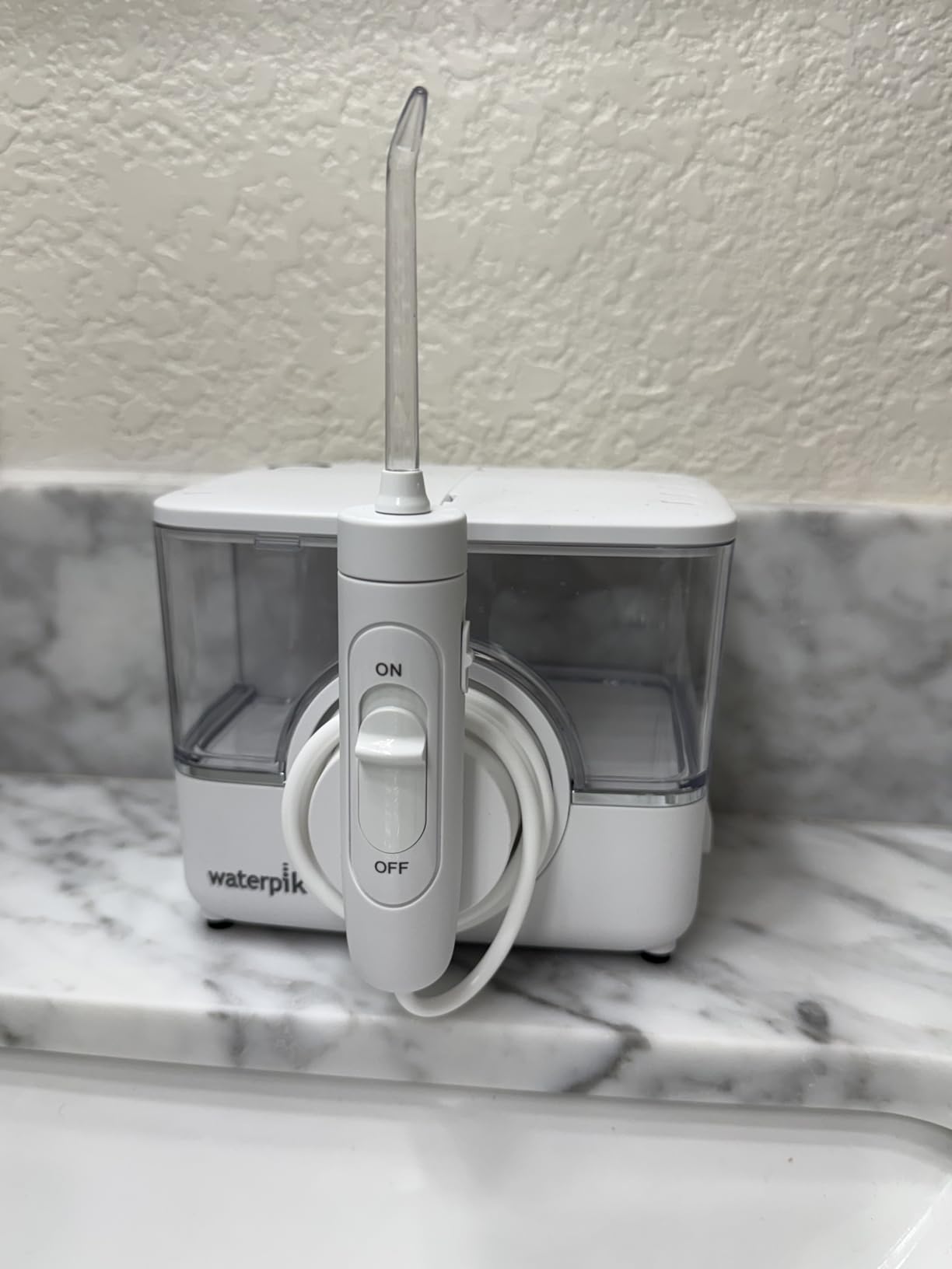 Waterpik ION Rechargeable Water Flosser with 10 Settings, 7 Tips, White | Portable Cordless Countertop for at Home Daily Gum Health, Dental Braces, Implants, ADA Accepted, WF-12 customer photo 2