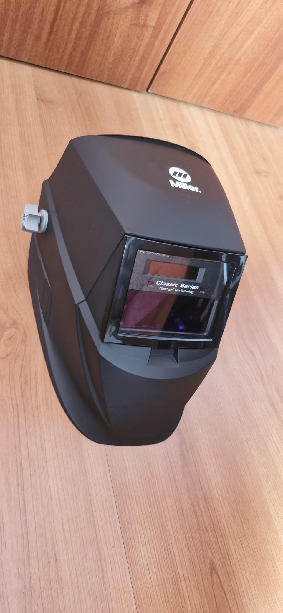 Miller Classic Series Welding Helmet, ClearLight Lens, Shade 8-13, Black | For the value-minded welder; TIG/MIG; variable shade 8-13; HD optics; comfortable headgear customer photo 1