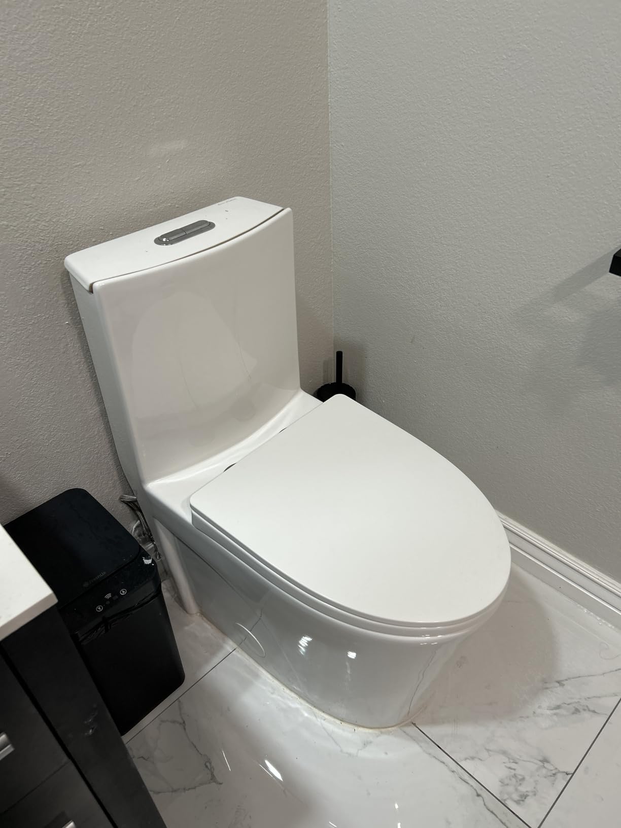 St. Tropez One Piece Modern Elongated Toilet with Dual Vortex Flush, Black Hardware customer photo 1