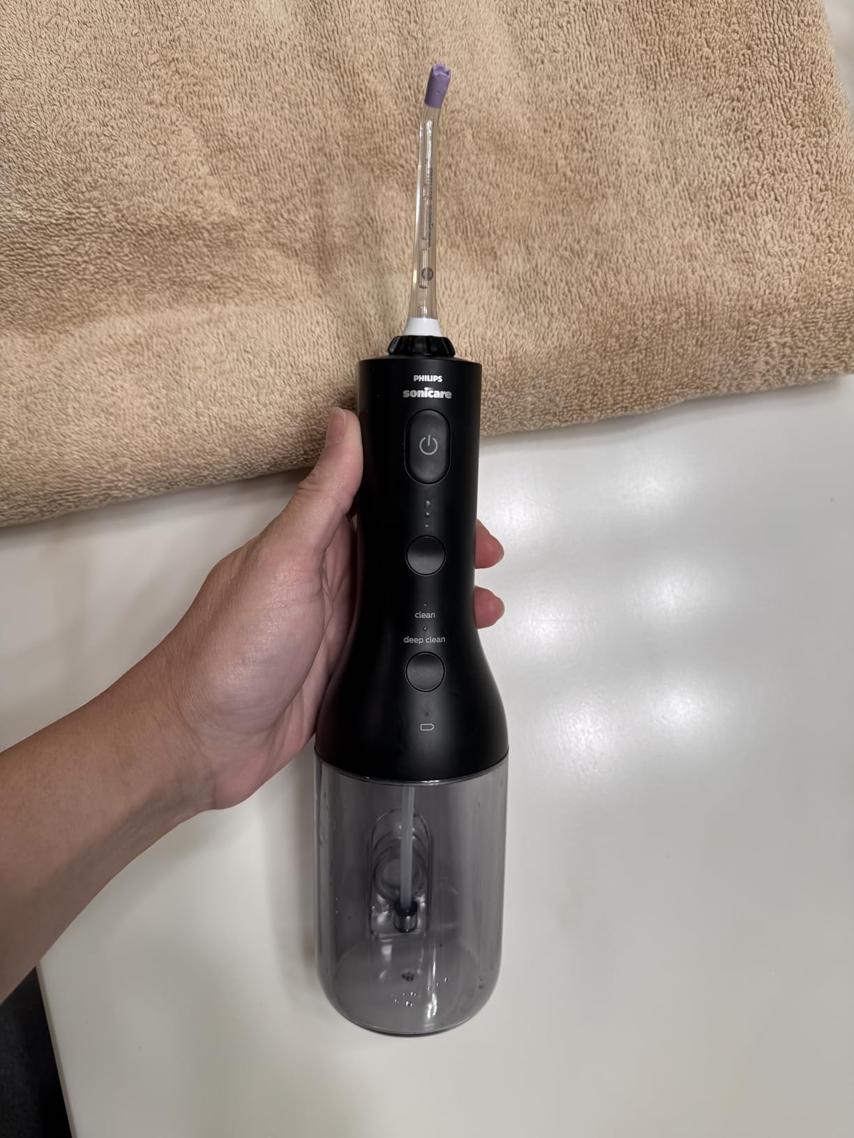 Philips Sonicare Cordless Power Flosser 3000, Water Flosser, 2 Nozzles | 150% Better Gum Health, Quad Stream Technology, 2 Floss Modes, 3 Pressure Levels, IPX7 Waterproof, Black HX3826/23 customer photo 1