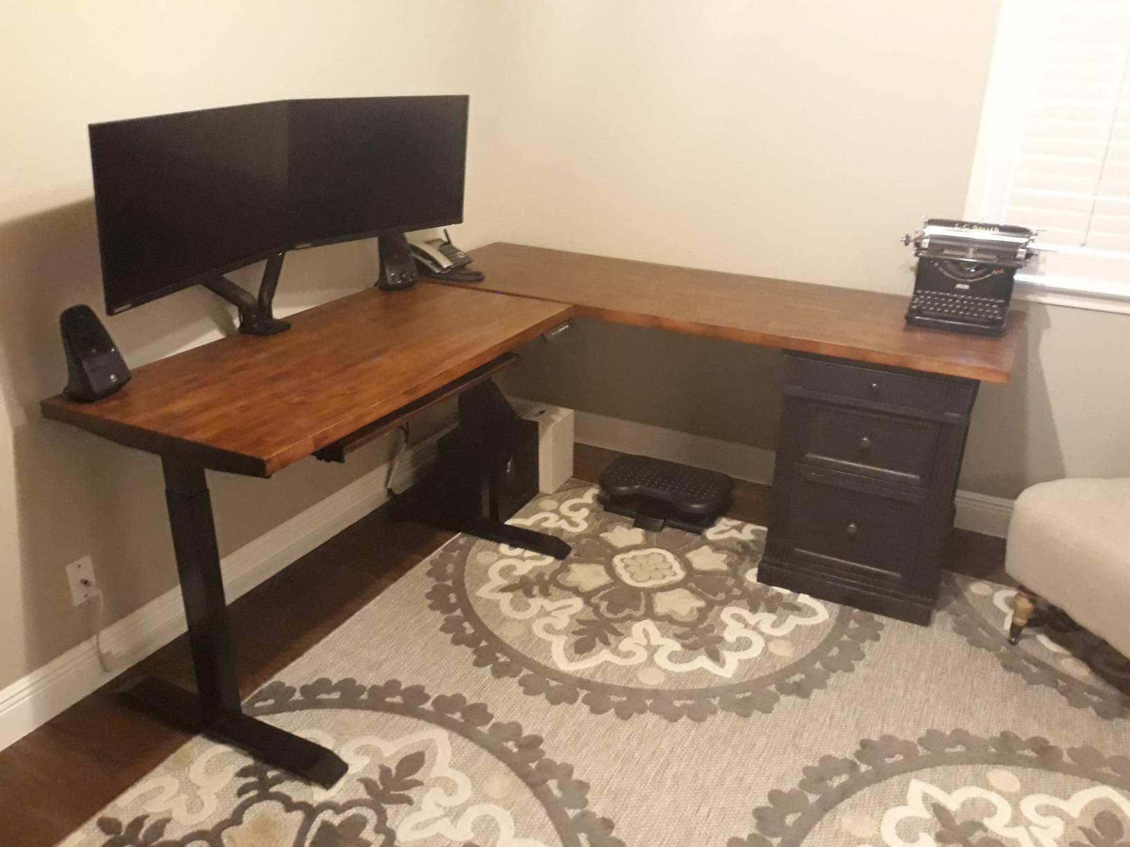 FEZIBO L Shaped Standing Desk with Arc LED & Power Outlet, Exclusive Uprated 3 Motors Support 330LBS, Electric Height Adjustable L Shaped Desk with Large Monitor Stand, Rustic Brown customer photo 1