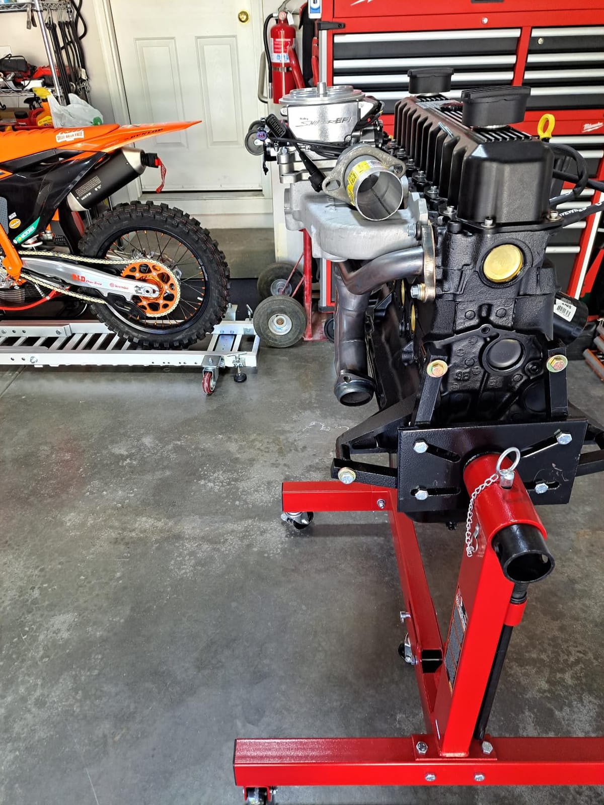 BIG RED Steel Rotating Engine Motor Stand, 3/4 Ton (1,500 lbs) Capacity with Foldable Frame, 5 Casters, 4 Adjustable Arms, 360 Degree Rotating Head, for Vehicle Maintenance, Auto Repair, Red, AT37912-1 customer photo 1