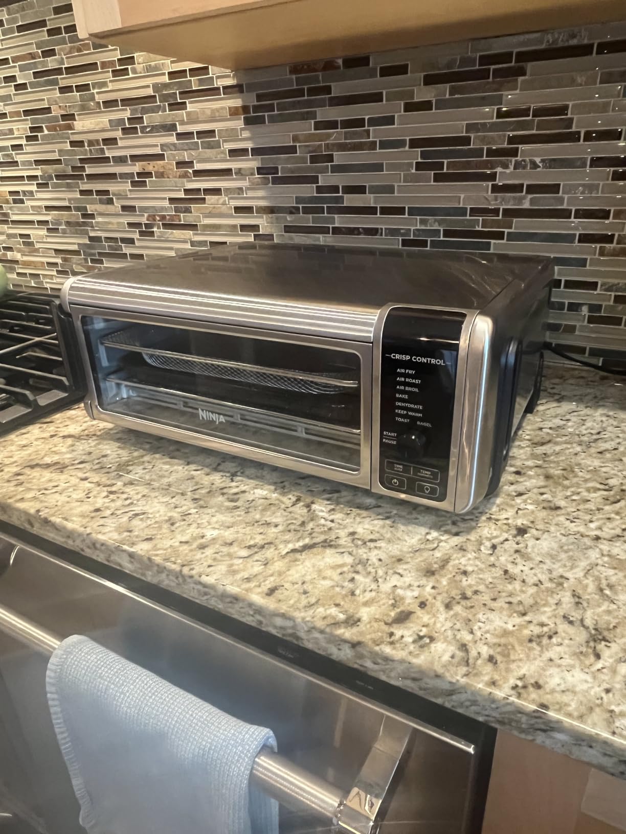 Ninja Flip Toaster Oven & Air Fryer, 8-in-1, Stainless Steel, SP151 | Air fry, bake, broil, toast, bagel, dehydrate, reheat, 1800W, Flip up & away, XL capacity customer photo 1
