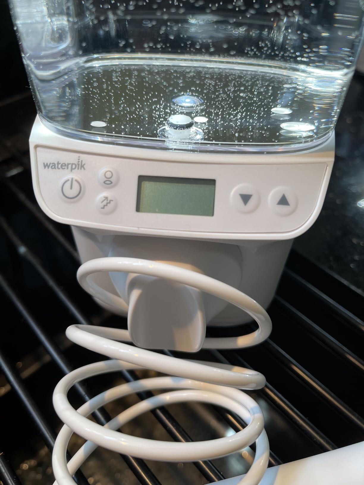 Waterpik Promax Countertop Water Flosser, SmartAdvance, 10 Settings, 5 Tips | Small and Quiet for Home Daily Gum Health, Dental Braces, Implants, Teeth Cleaning, Multiple Users, ADA Accepted, WF-23 customer photo 1