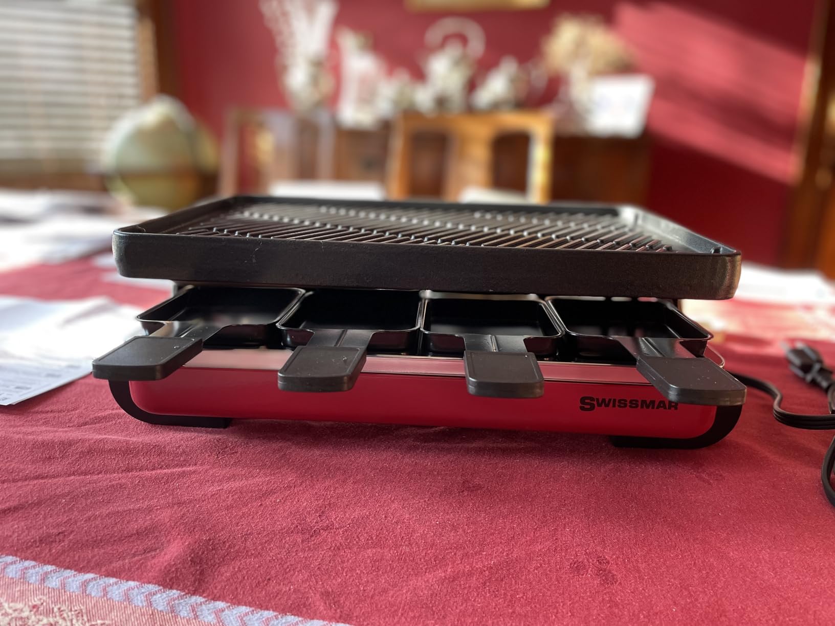 Swissmar Classic 8-Person Raclette Party Grill with Reversible Cast Iron Grill Plate/Crepe Top, Indoor Electric Raclette Grill & Griller - Red customer photo 1