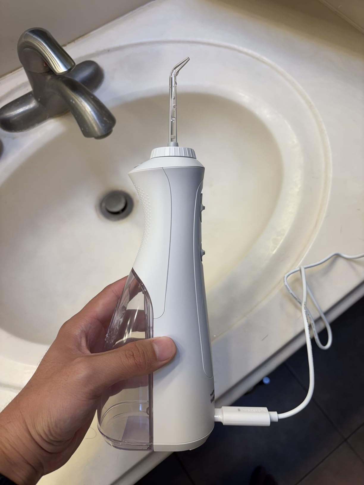 Waterpik Cordless Pearl Portable Water Flosser, Rechargeable, White | 2 Settings, 4 Tips, for Daily Gum Health & Cleaning Teeth, Dental Braces, Implants, ADA Accepted, WF-13 customer photo 2