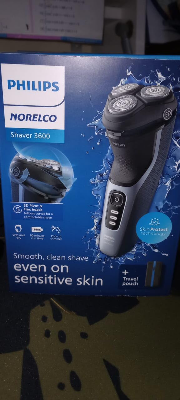 Philips Norelco 3600 Electric Shaver, Storm Blue | 27 Self Sharpening ComfortCut Blades, 5D Pivot & Flex Heads, Wet or Dry Use, Includes Travel Pouch, S3243/91 customer photo 1