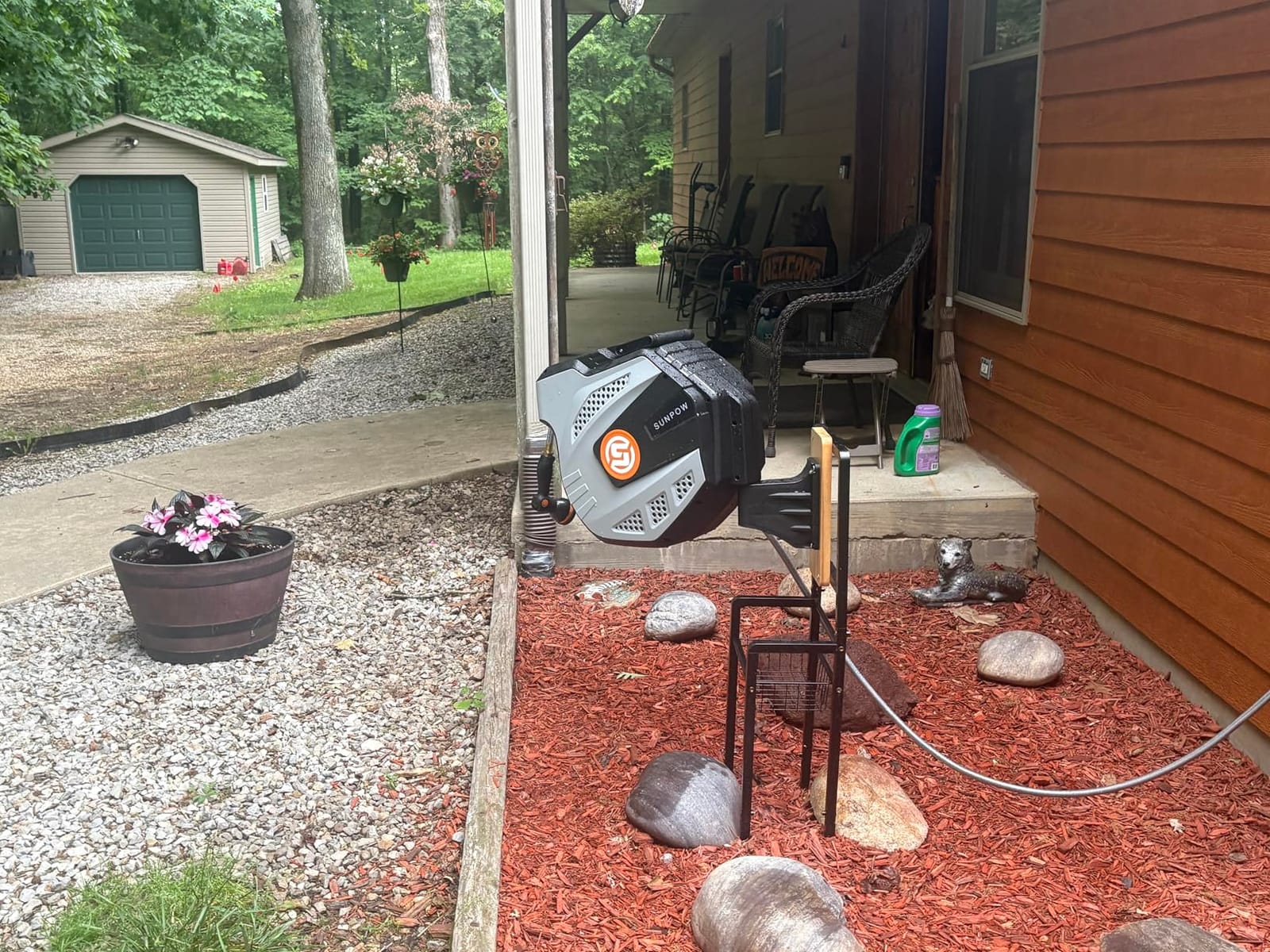 SUNPOW Retractable Garden Hose Reel - 1/2 inch x 50 ft Heavy Duty Wall Mounted Hose Reel with 3/4 inch Brass Fitting & 10 Sprayer Nozzle - Any Length Lock, Auto Rewind System, 180 Swivel Bracket - Grey customer photo 1