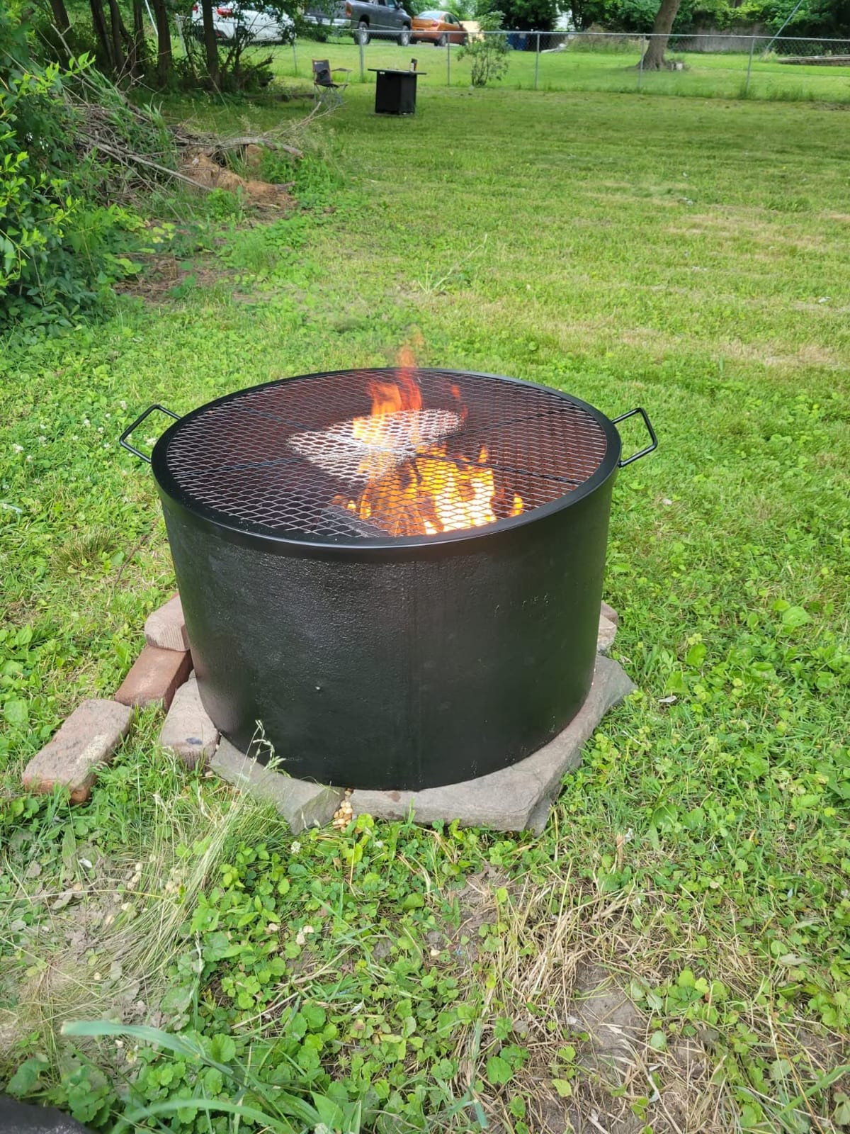 onlyfire Heavy-Duty Steel Round Fire Pit Grill Grate with X-Marks Design | Portable Cooking Grate with Handles for Outdoor BBQ, Camping, Picnics - 24 Inch customer photo 2