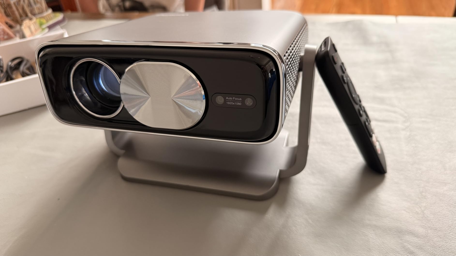 Smart 4K Projector [Bundled with Google TV Stick] with WiFi and Bluetooth, 3000ANSI, Auto Lens Cap, Portable Outdoor Movie Projector with Built-in Apps Auto Focus for Ceiling/Home Theater/Bedroom customer photo 1