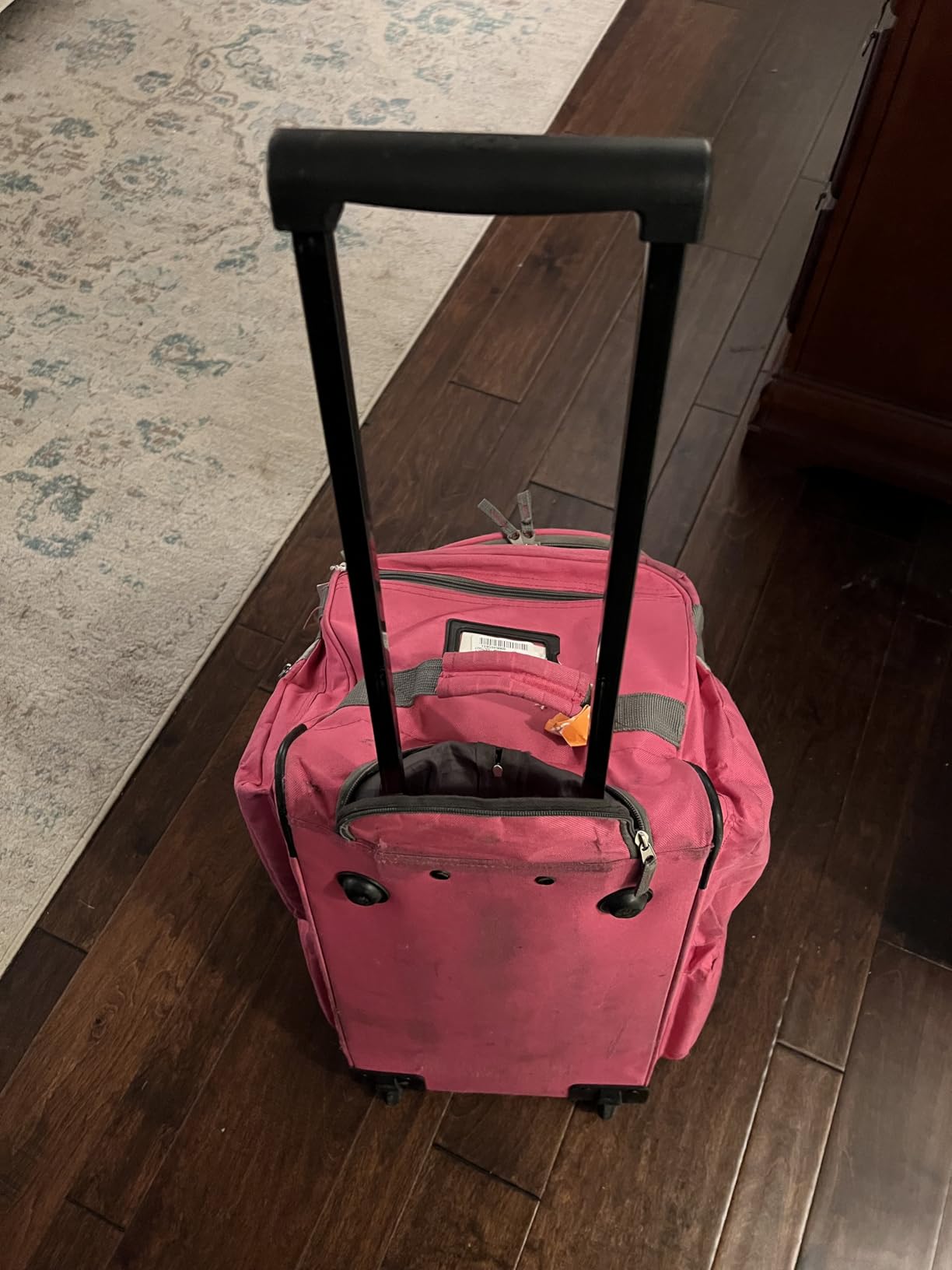 Olympia U.S.A. 22 inch Carry On 8 Pockets Wheeled Rolling Duffel Bag Water Resistant Luggage Lightweight Travel Suitcase with Retractable Handle customer photo 2