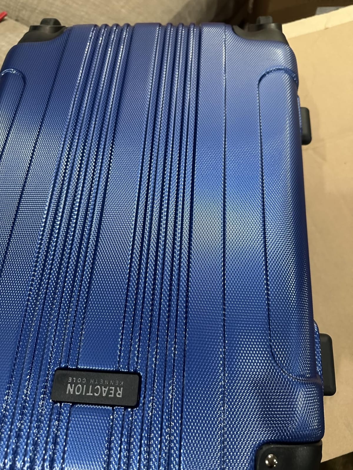 Kenneth Cole REACTION Out of Bounds Lightweight Hardshell 4-Wheel Spinner Luggage, Magenta, 28-Inch Checked customer photo 1