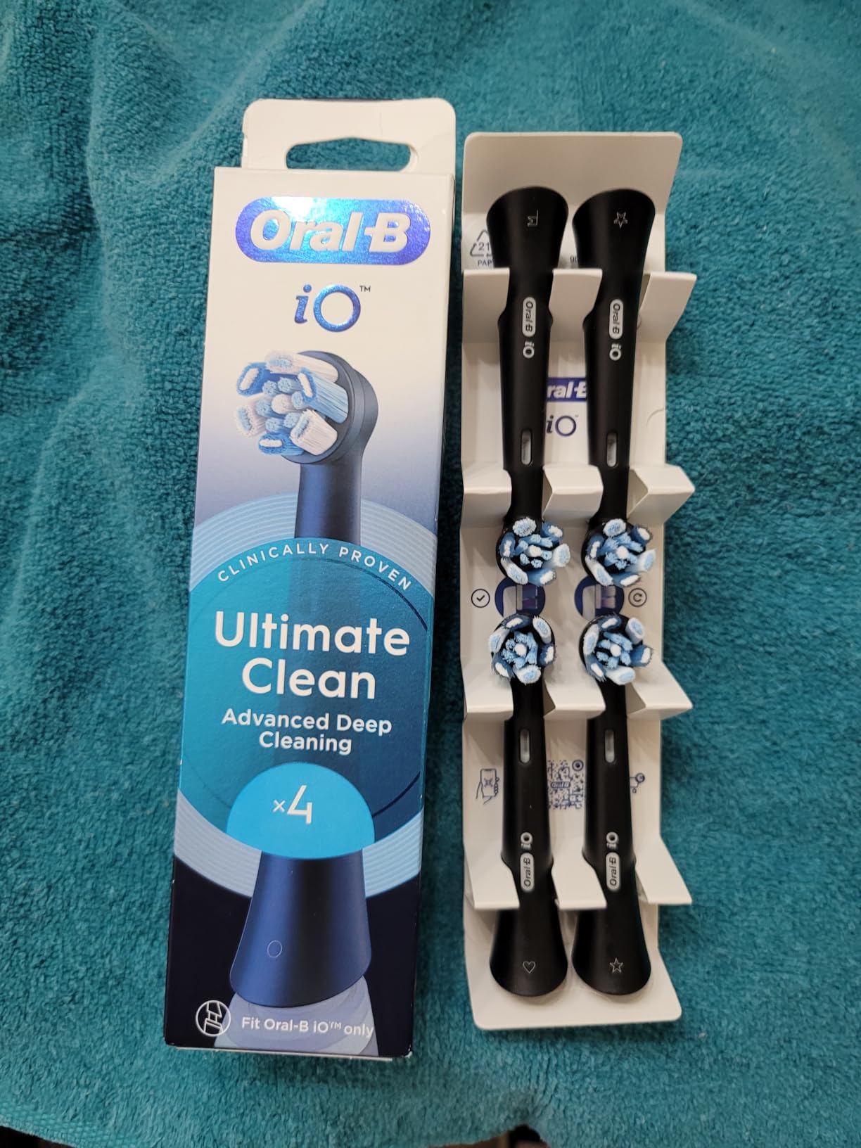 Oral-B iO Ultimate Clean Electric Toothbrush Head, Twisted & Angled Bristles for Deeper Plaque Removal, Pack of 4, Suitable for Mailbox, Black customer photo 1