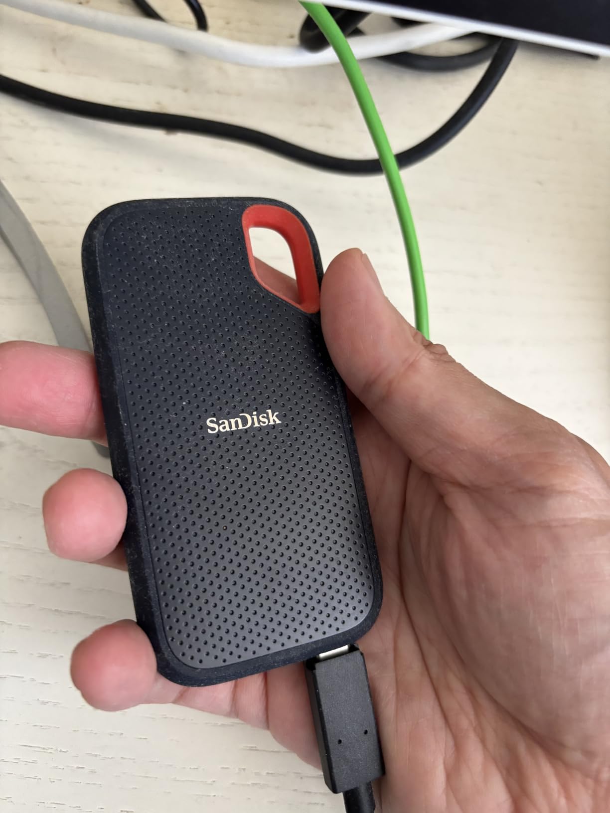 Sandisk 2TB Extreme Portable SSD, Up to 1050MB/s, USB-C, USB 3.2 Gen 2, IP65 Water and Dust Resistance, Updated Firmware, External Solid State Drive, SDSSDE61-2T00-G25 customer photo 1